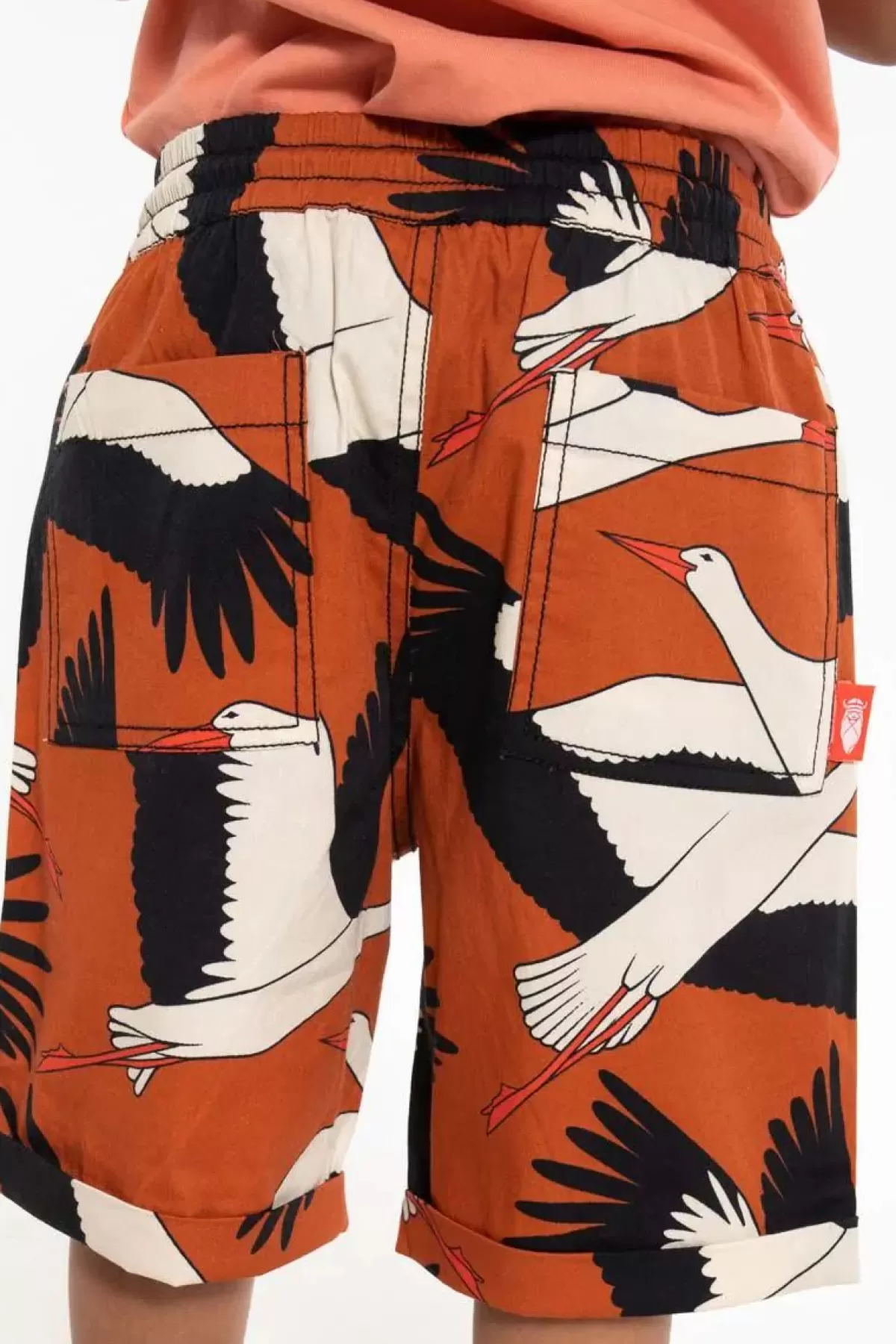 Pantaloncini estivi in popeline per bambini Danalfred - Rosso ruggine con ricamo cicogna