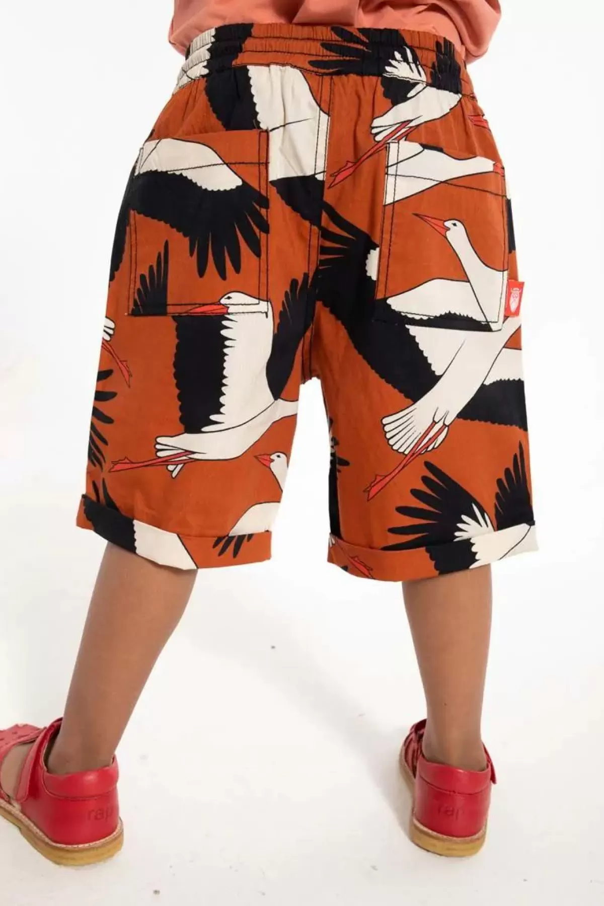 Pantaloncini estivi in popeline per bambini Danalfred - Rosso ruggine con ricamo cicogna